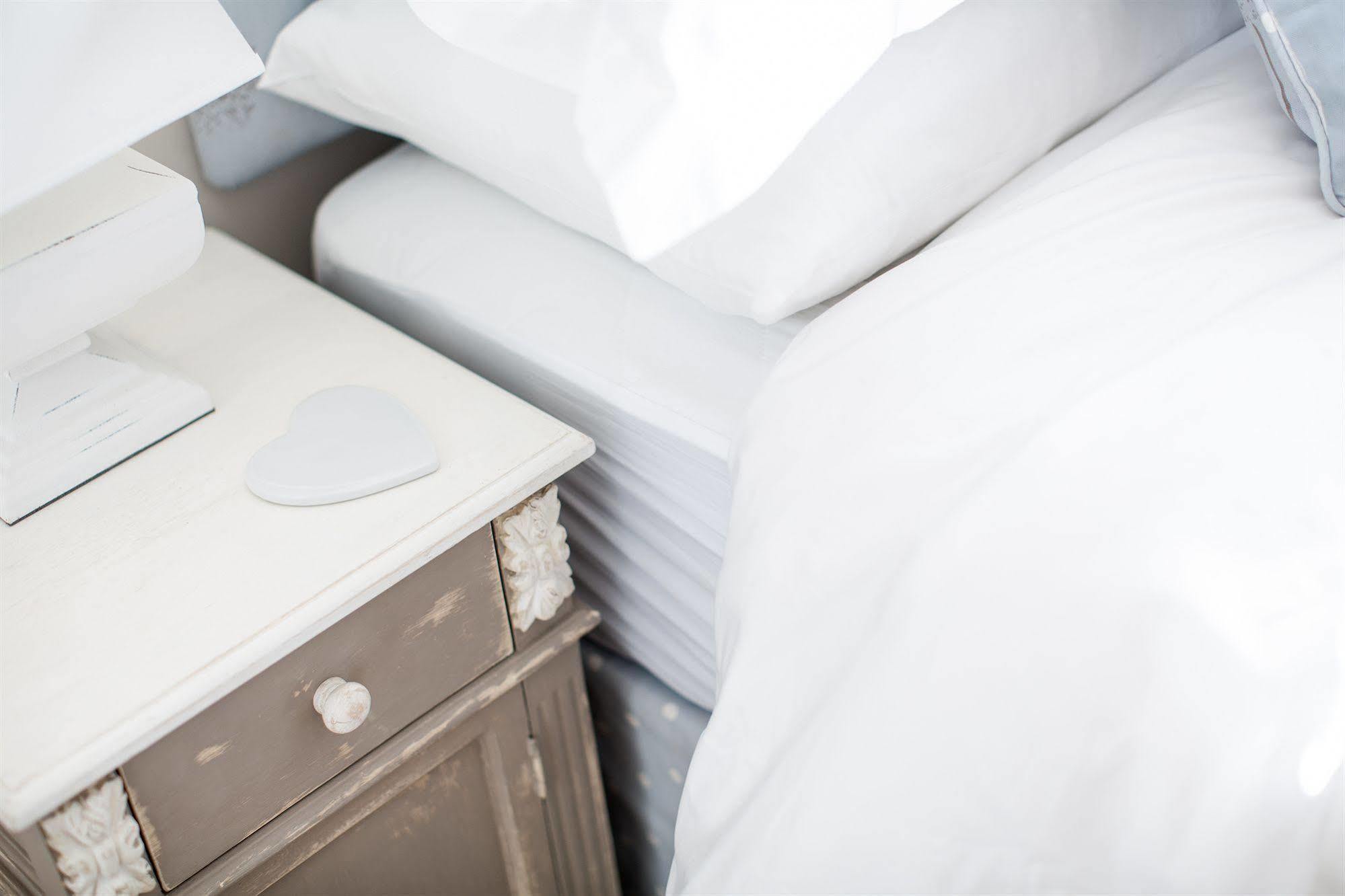 Grays Boutique B&B Bath Exterior photo A bed with a nightstand