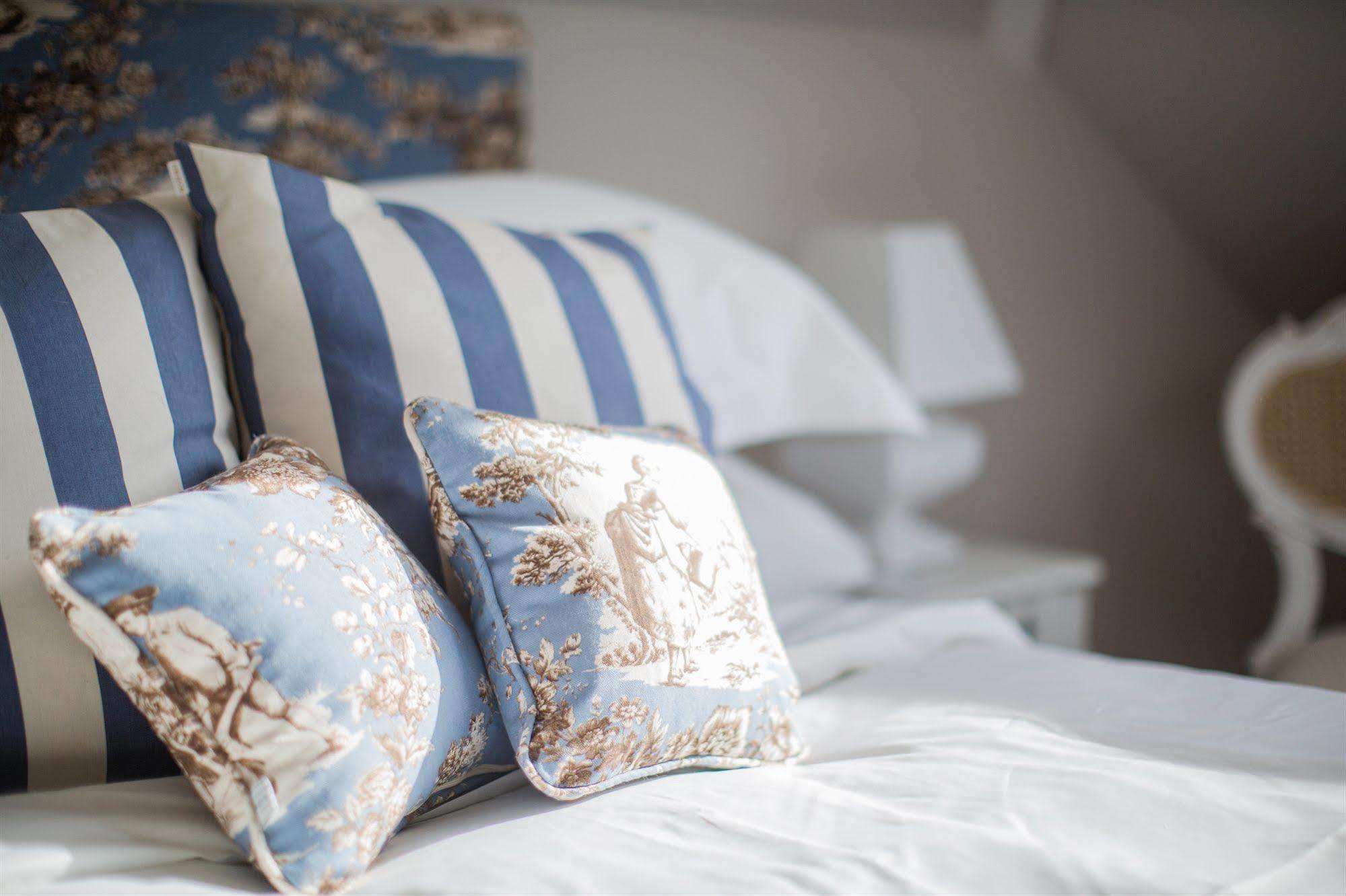 Grays Boutique B&B Bath Exterior photo Cushions on a bed